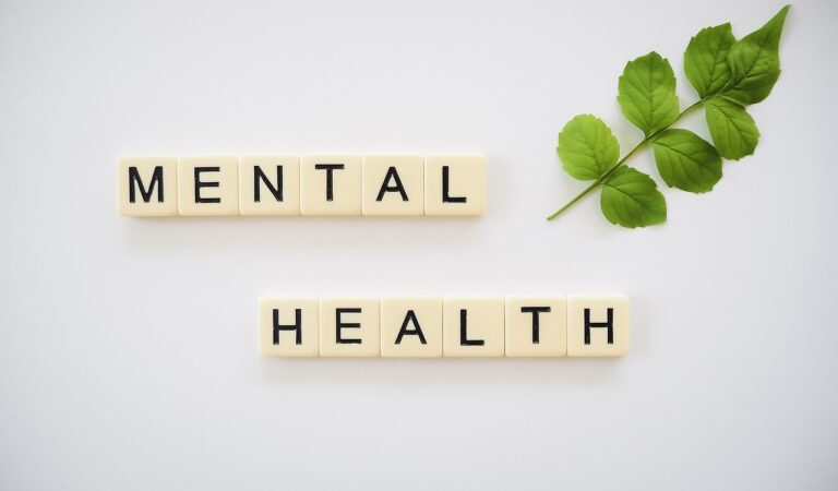 Foto von Buchstabenperlen, die den Begriff "Mental Health" zeigen